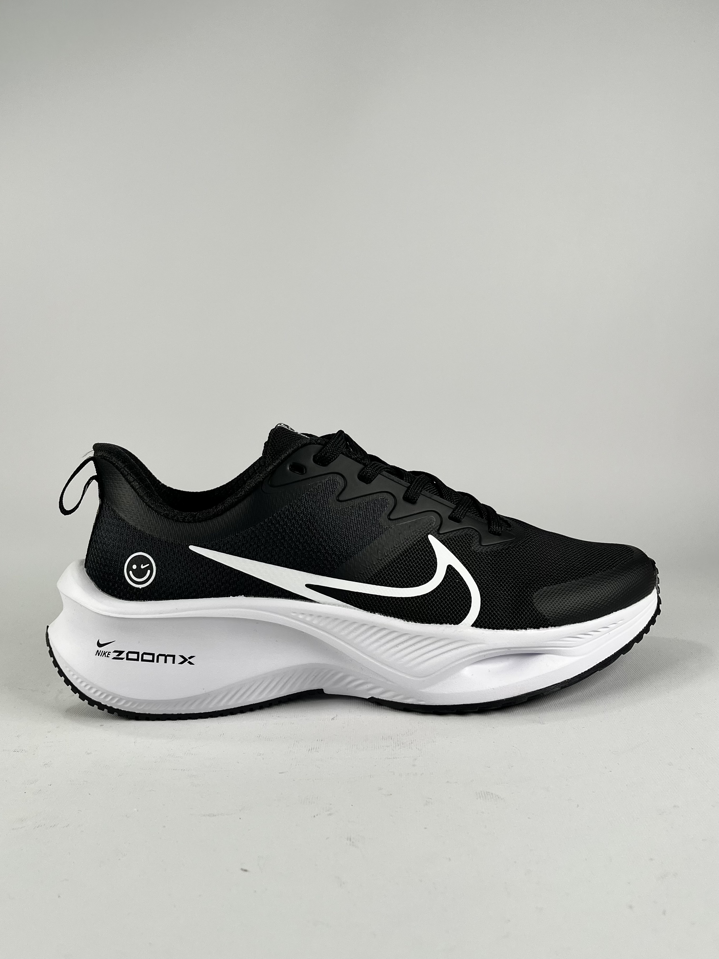 کفش ورشی مردانه و زنانه نایک زووم ایکس مشکی زیره سفید  Nike ZoomX Smiley